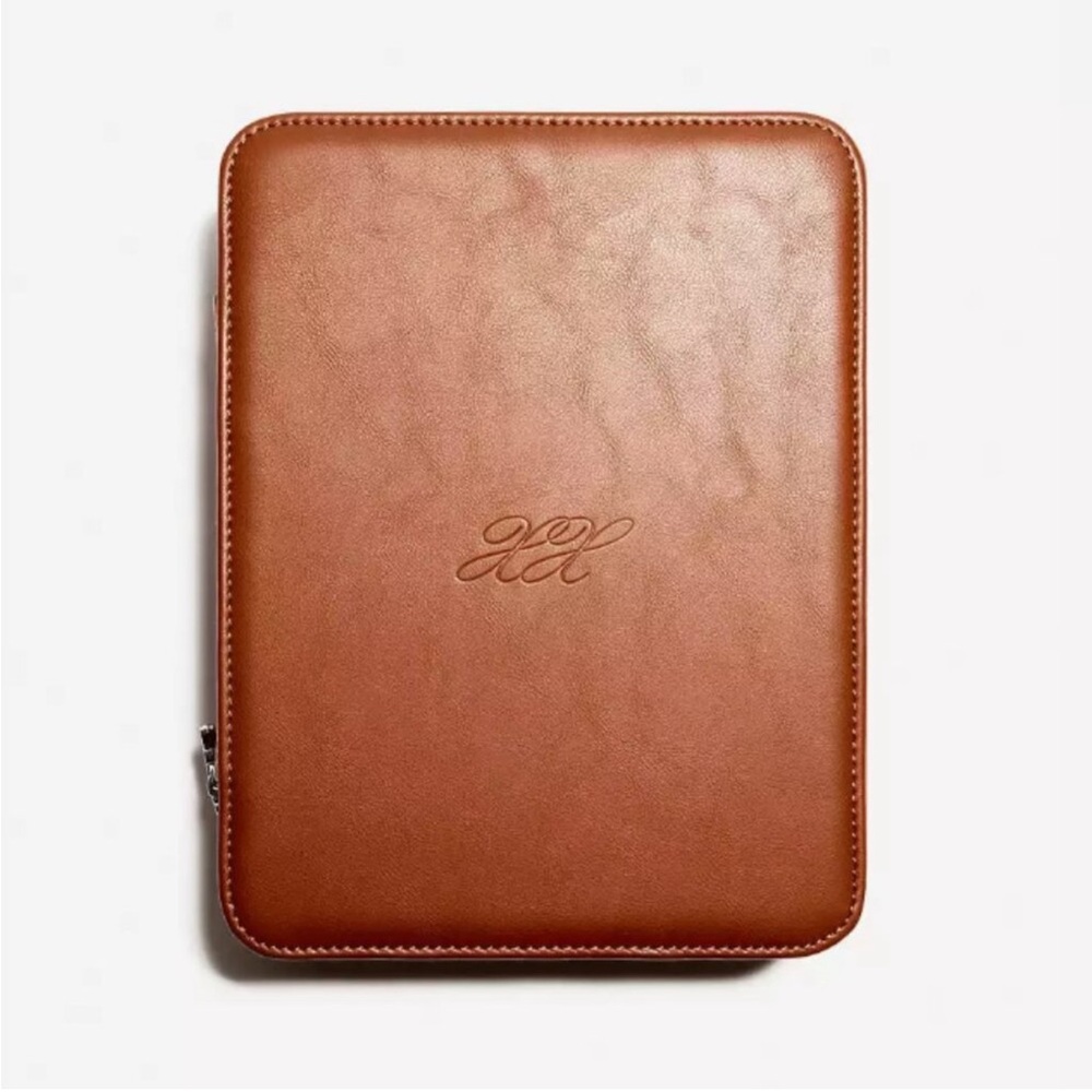 Never before used, chocolate brown Lexxola Jet-Setter Travel Case